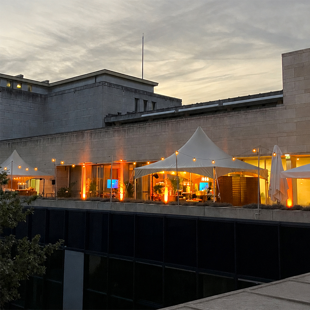 Albert rooftop brussels summer sunset party tents lights